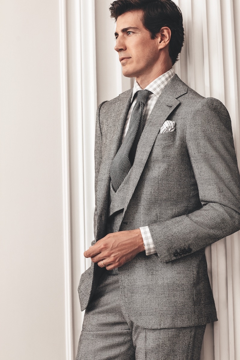 Iconic III: Black/grey Glen check single-breasted three-piece suit; light grey gingham cotton shirt; mid-grey textured tie