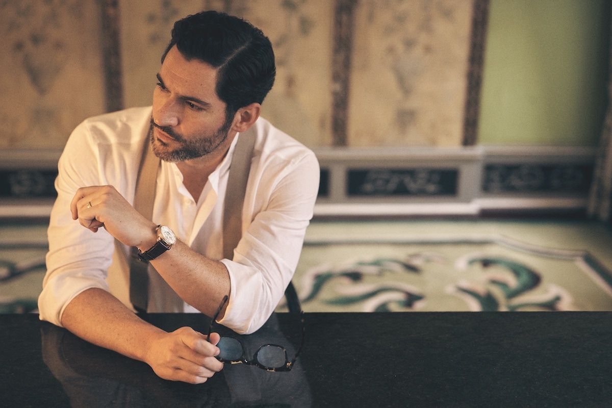 White linen shirt, Budd Shirtmakers; oatmeal linen braces, New & Lingwood; brown tortoise optical glasses, Cutler & Gross; rose-gold Villeret Perpetual Calendar with brown leather strap, Blancpain