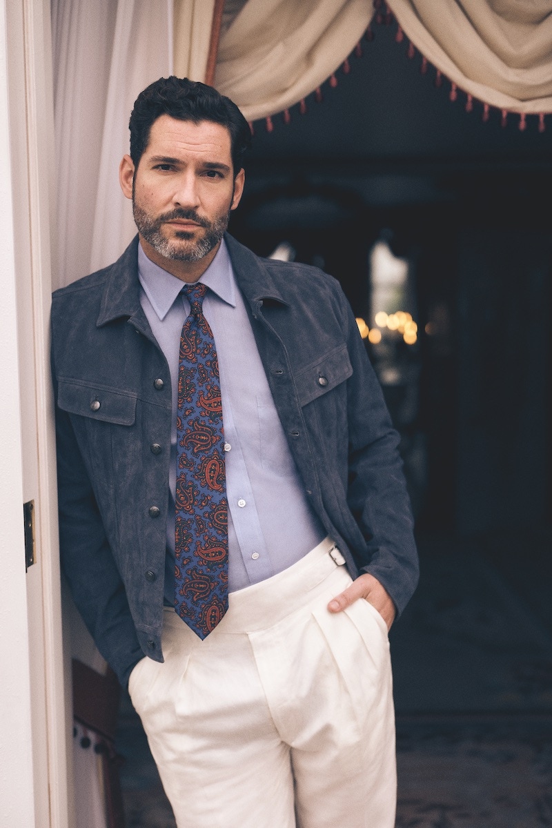 Navy suede jacket and cream linen Gurkha trouser, both Ralph Lauren Purple Label; light blue linen shirt and blue silk paisley print tie, both Budd Shirtmakers