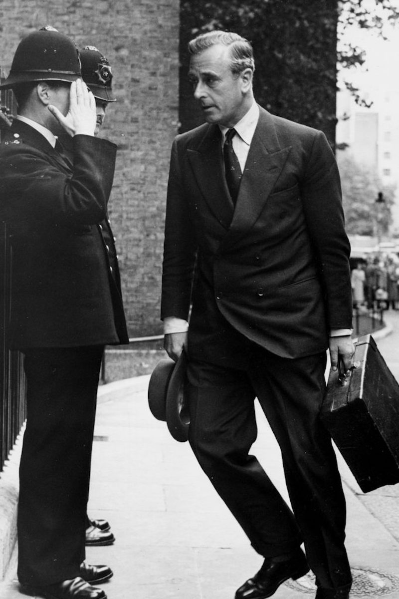 A policeman saluting Mountbatten as he arrives at 10 Downing Street in 1956 for the Suez crisis talks (Photo via Getty)