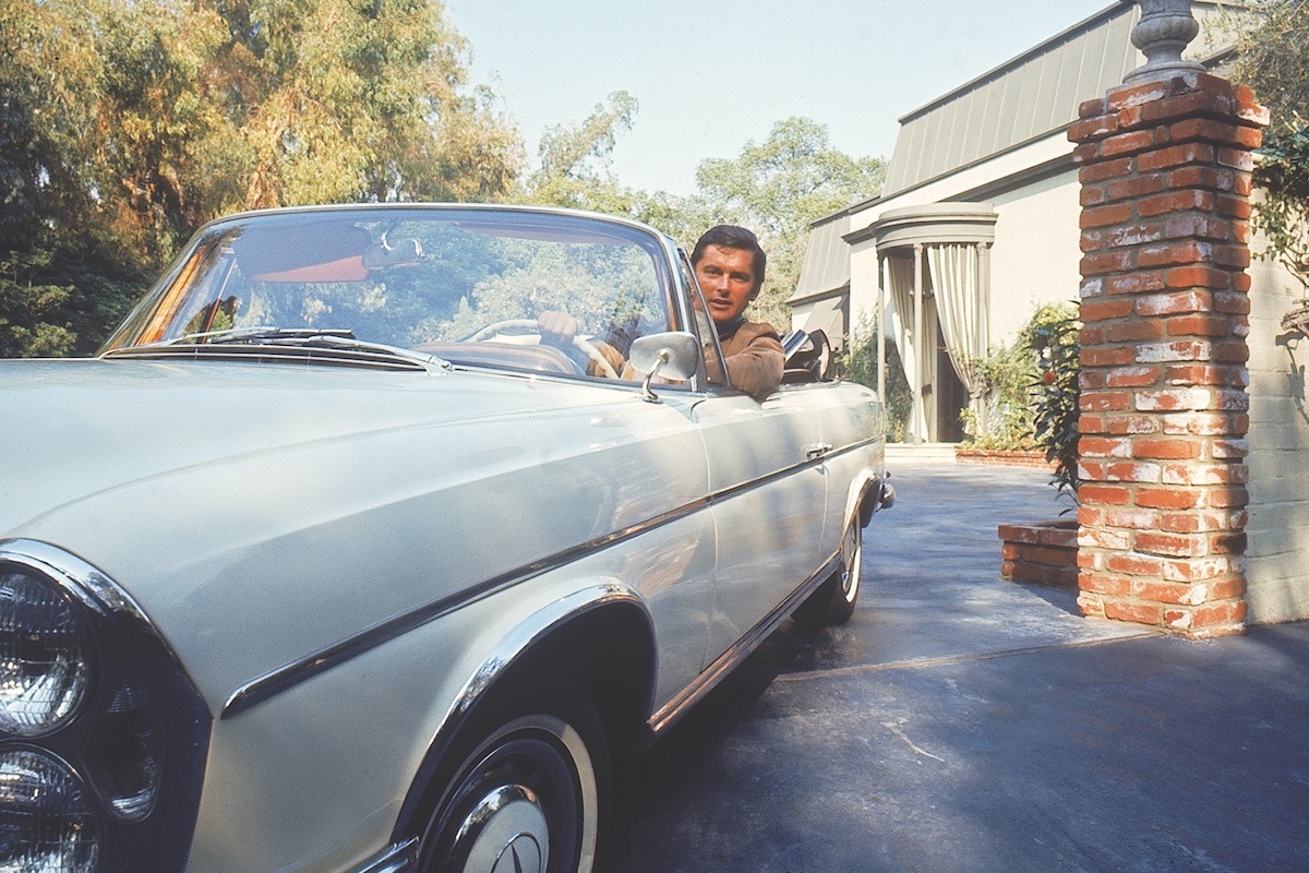 Robert Evans driving from his home. (Photo by Alfred Eisenstaedt/The LIFE Picture Collection via Getty Images)