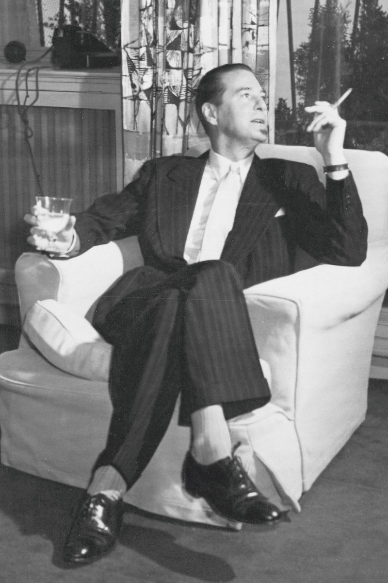 Terence Rattigan shows how to elegantly smoke a cigarette, 1956 (Photo by ANL/REX/Shutterstock (1391939a)