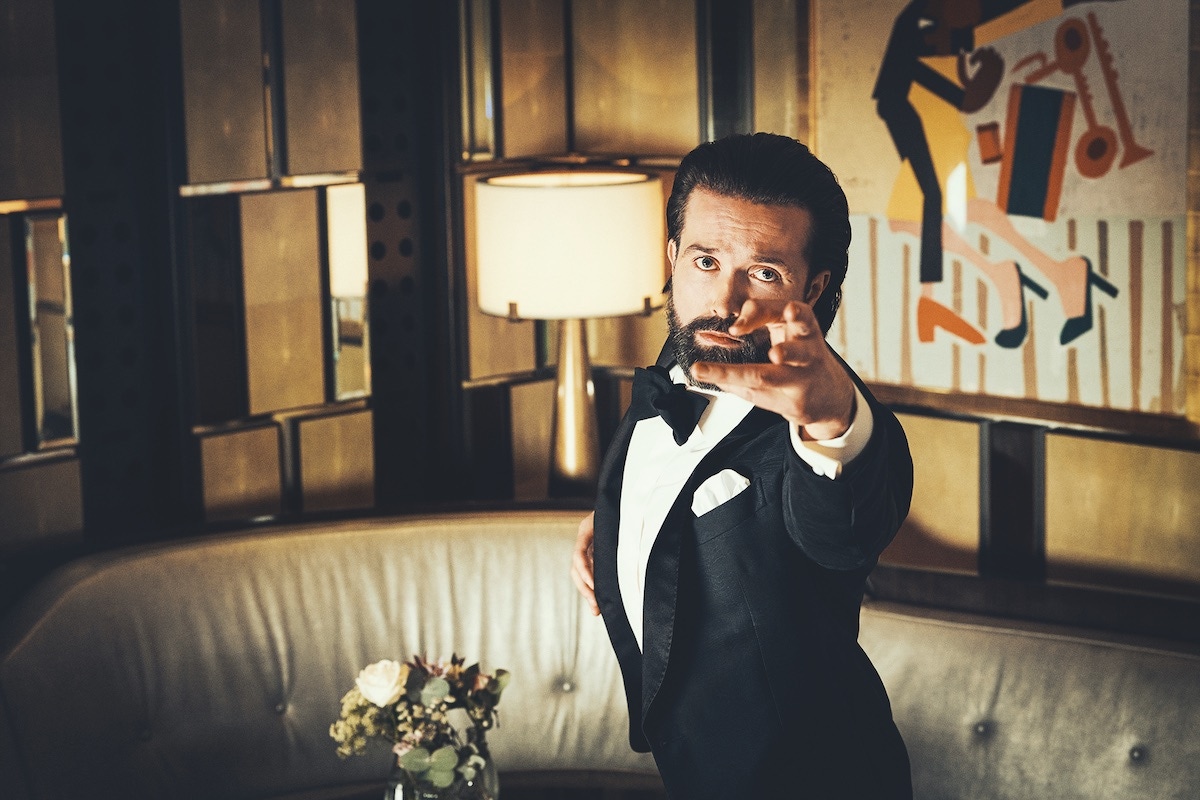 Black and navy silk and wool tuxedo, Ermenegildo Zegna XXX; off-white signature cotton twill tuxedo shirt, Eton Shirts; black cotton bow-tie and white cotton pocket-square, Ralph Lauren Purple Label.