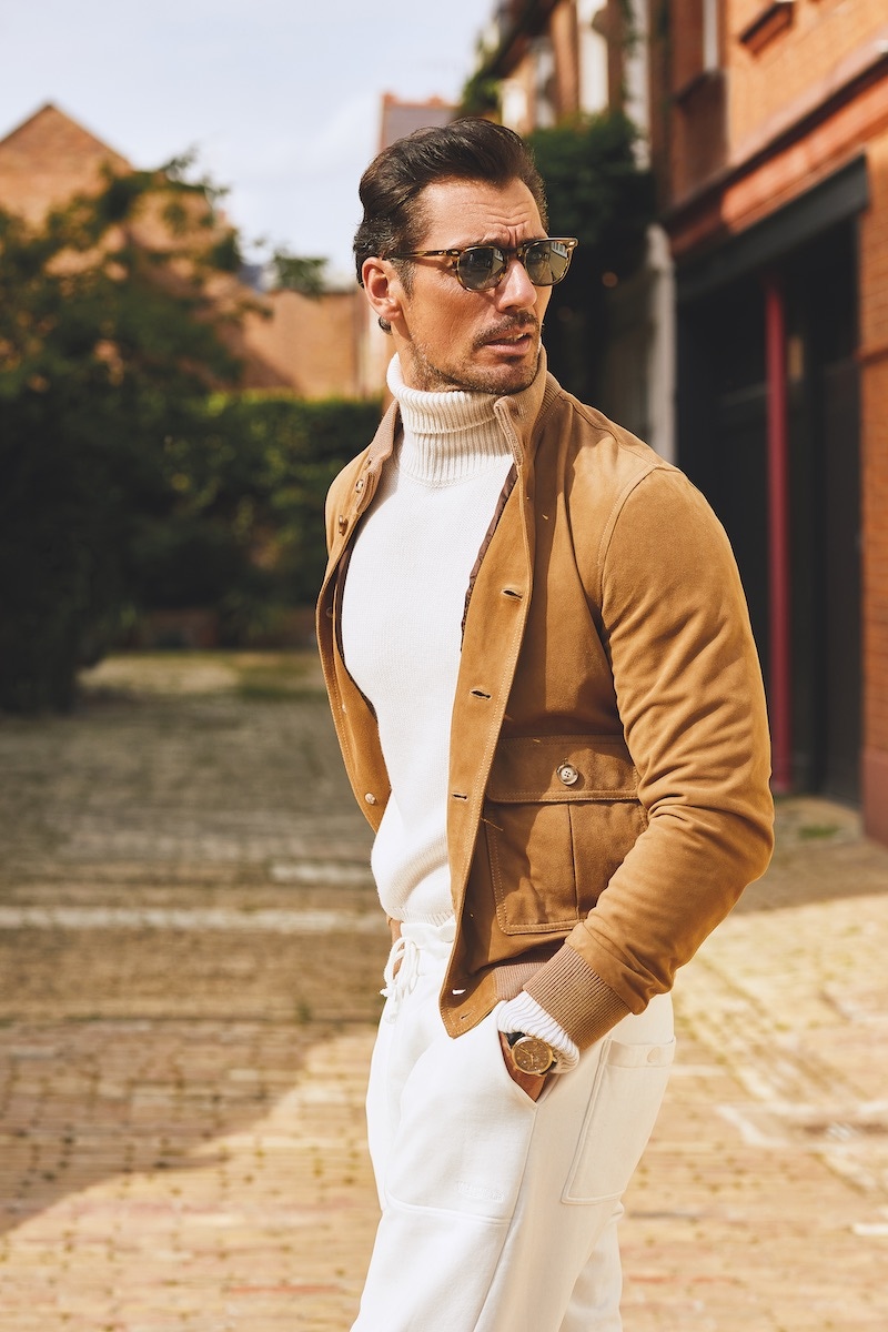 Camel suede Valstarino jacket, Valstar; ecru cashmere Submarine roll-neck, Private White V.C.; white 100% cotton Heritage jogger, David Gandy Wellwear; Tatah Sun sunglasses, MOSCOT. Avigation BigEye A7, titanium, Longines.