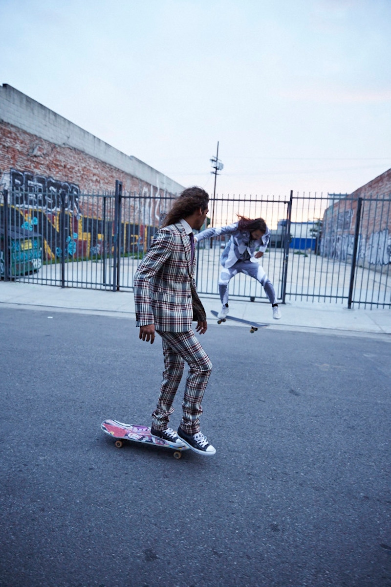 From Left: Black, burgundy and ivory check lightweight wool suit, Valentino; white linen shirt, Alfred Dunhill; purple checked silk tie, Hackett; navy canvas trainers, property of the skater. Black and white Prince-of-Wales check wave-print cotton suit, Alexander McQueen; pale-grey cotton shirt, Caruso; grey silk tie, Ralph Lauren Purple Label; white canvas trainers, Vans, property of the skater.