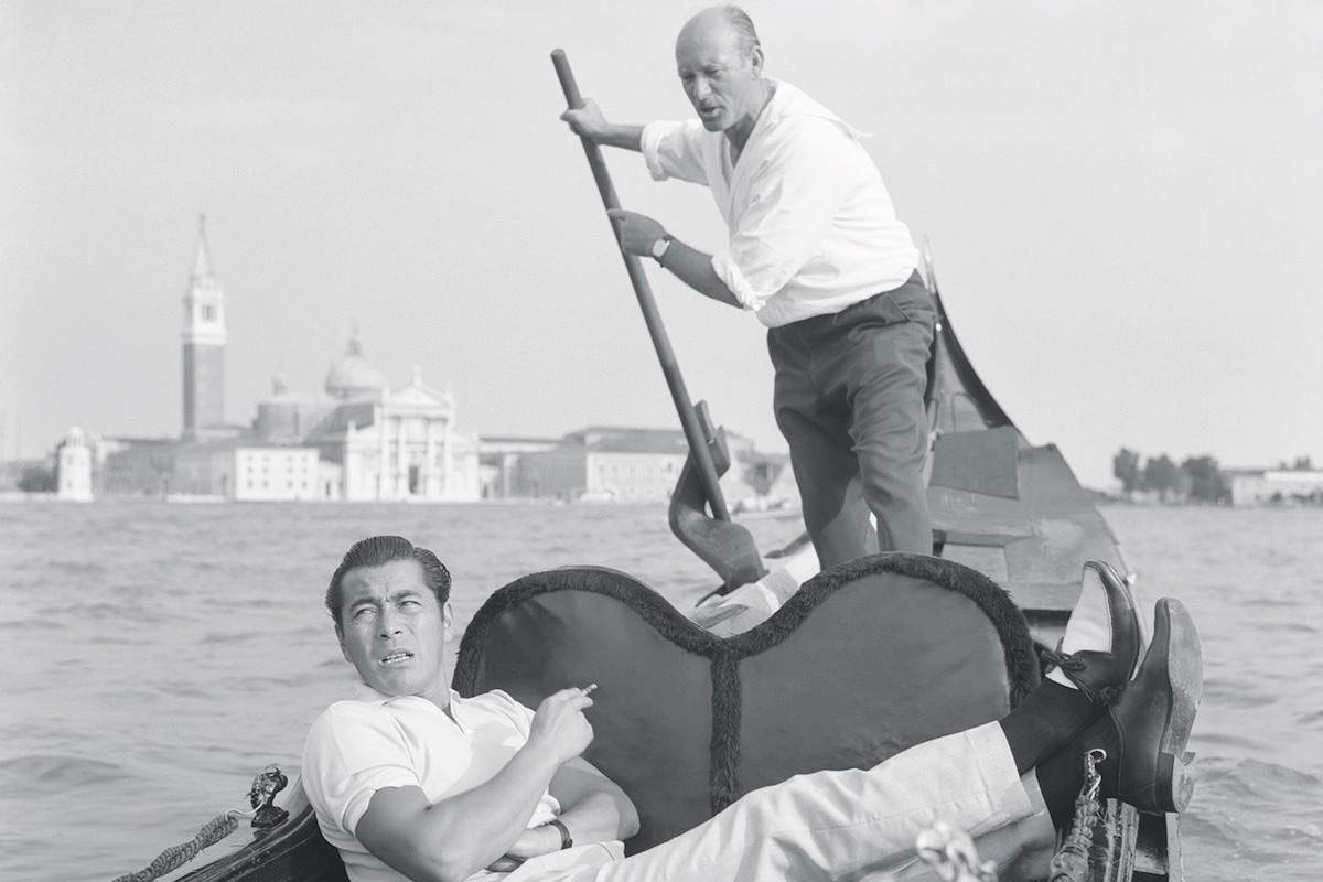 Taking a gondola ride during a trip to Venice (Photo by Archivio Cameraphoto Epoche/Getty Images)