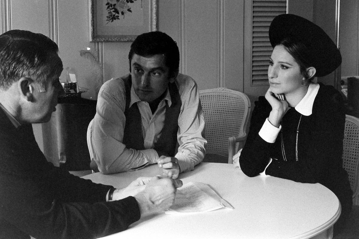 Head of Paramount Pictures Robert Evans with actress Barbra Streisand talking to a man, November 1968(Photo by Alfred Eisenstaedt/The LIFE Picture Collection via Getty Images)