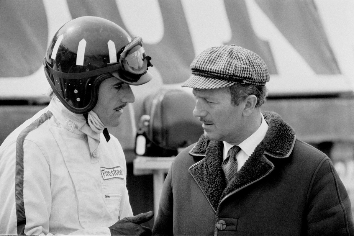 Colin Chapman (right) with Graham Hill at Silverstone, 1967. (Photo by Victor Blackman/Express/Hulton Archive/Getty Images)