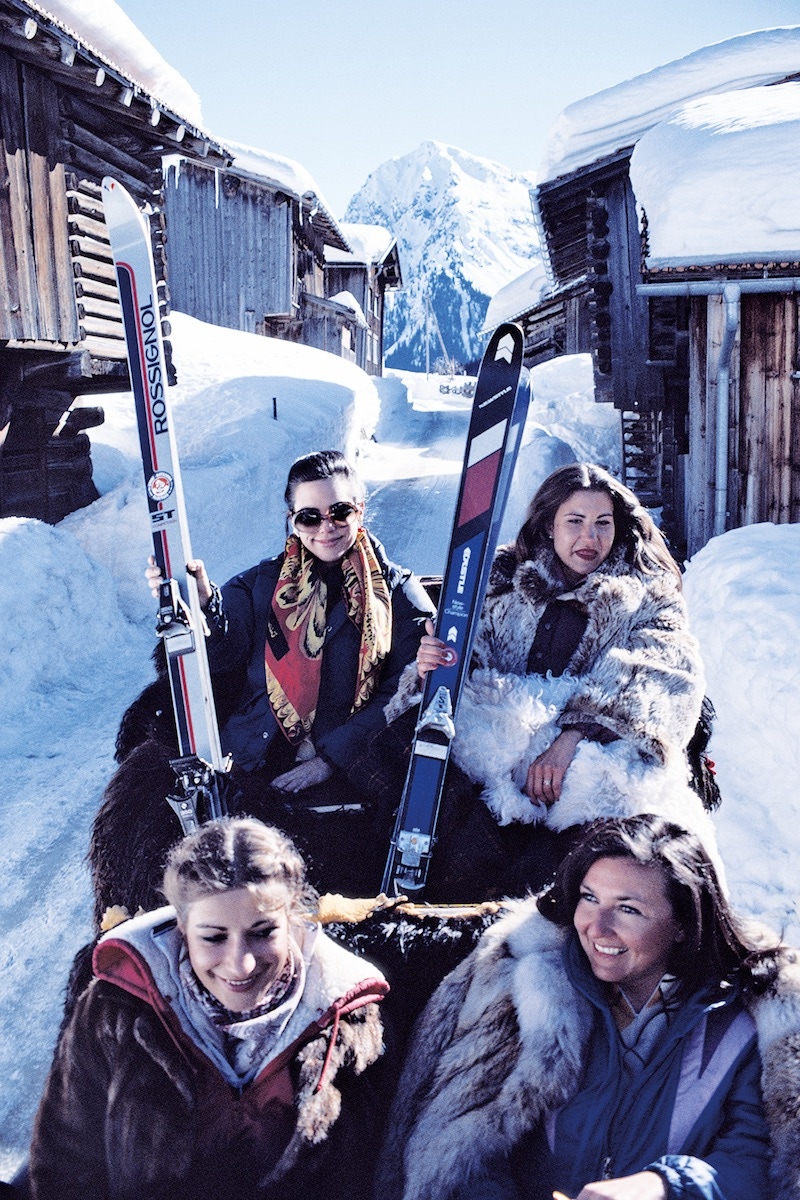 Skiers in a horse-drawn gondola in Klosters, Switzerland, in 1981