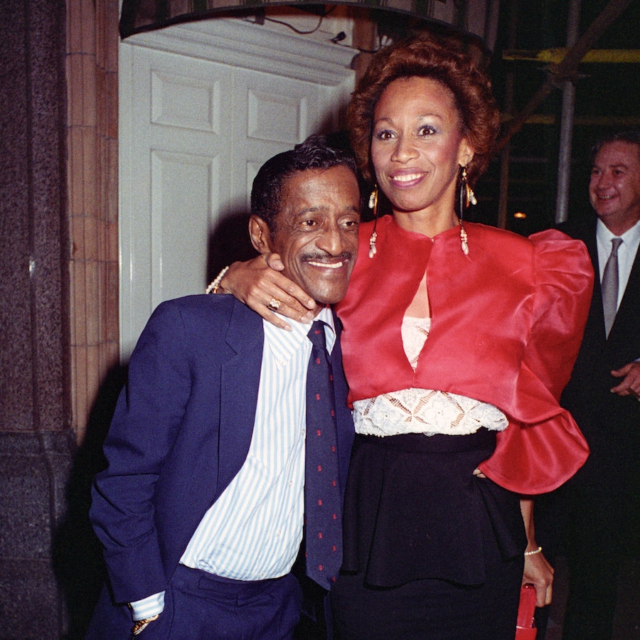 Sammy Davis Jr. with wife at Harry's Bar, 1988