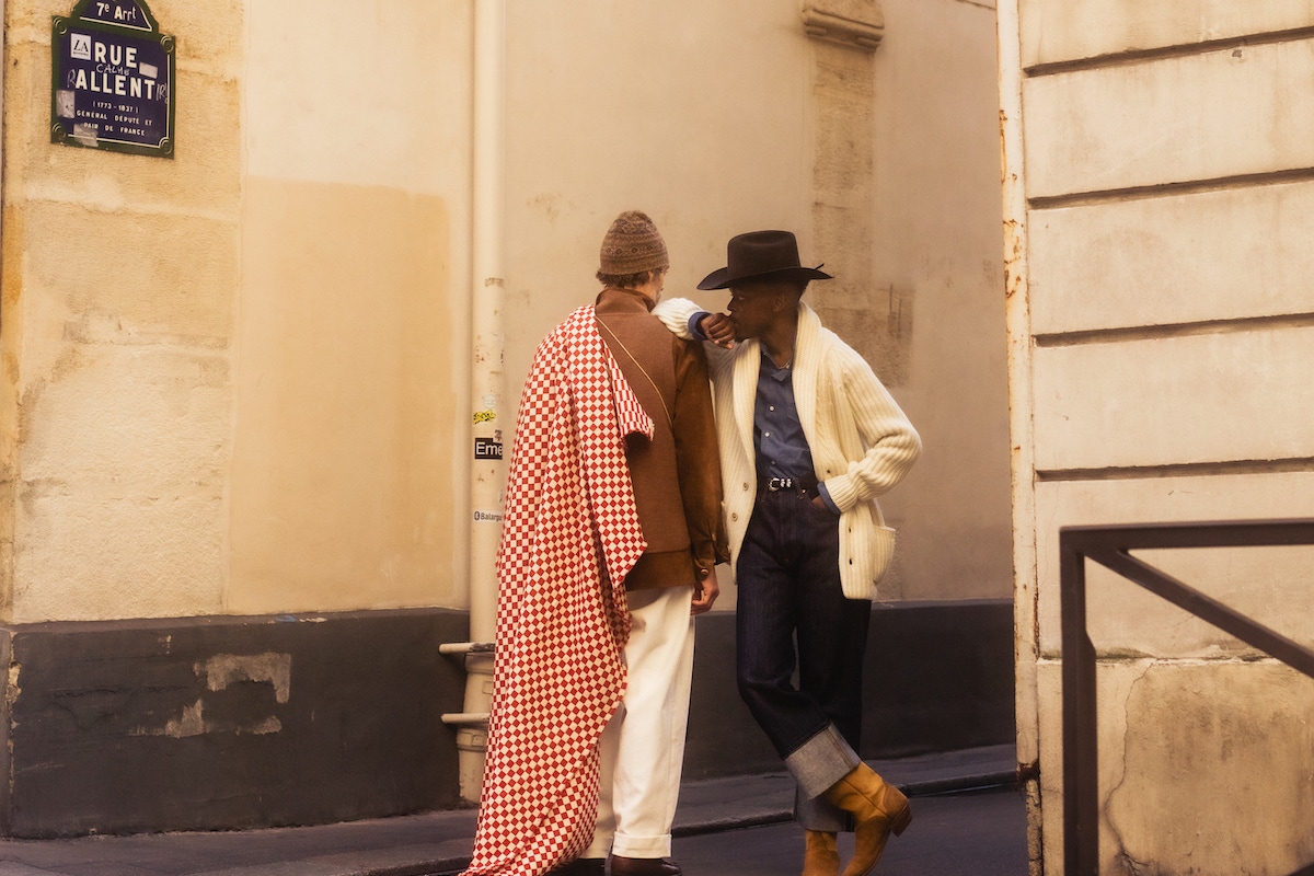 Kevis wears: blue cotton denim shirt, Lorenzo Cifonelli for The Rake; white shawl cardigan, Anderson & Sheppard; hat, denim and boots, models own.