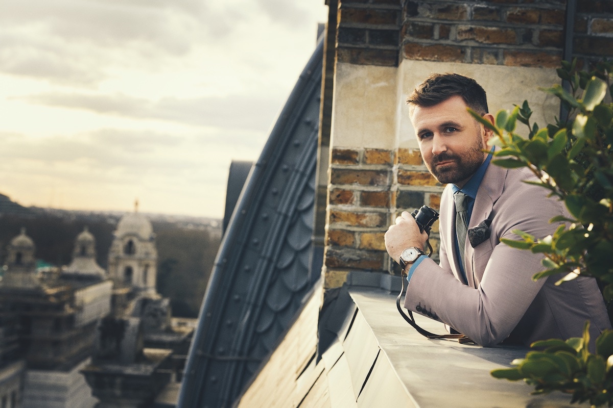 Pink wool single-breasted jacket, Richard James; petrol brushed cotton shirt, Budd Shirtmakers; black-and-white silk checked tie, Ralph Lauren Purple Label. Rose-gold Traditionnelle Complete Calendar with brown alligator strap, Vacheron Constantin. Pocket-square, property of The Rake.