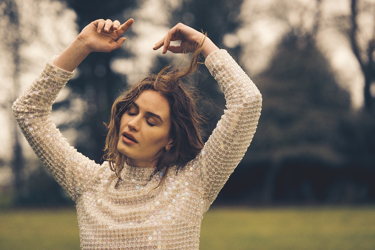 Betsy wears silver embellished long sleeve mini dress, Thom Laurence.