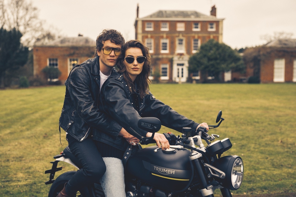 Sid wears vintage leather biker jacket, Schott; T-shirt, Brunello Cucinelli; black jeans, Frame; glasses, Kirk Originals x Rolling Stones. Betsy wears black leather biker jacket, vest and jeans, Dolce & Gabbana; sunglasses, Lanvin.